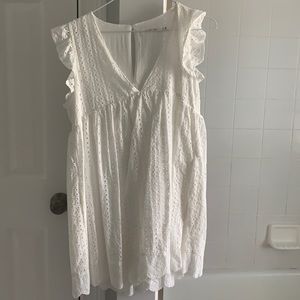 beautiful white romper dress from a local boutique